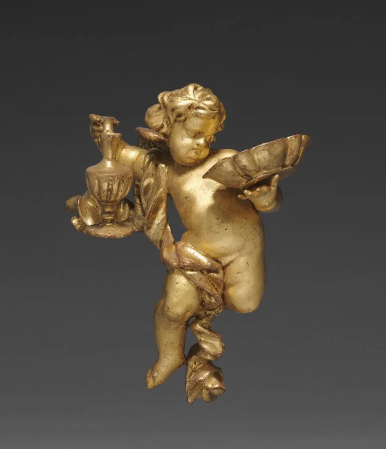 Joseph Matthias Goetz, Altarpiece with Relics, detail of a putto with a ewer, around 1735 to 1740, gilded wood. Cleveland Museum of Art. Gilded surfaces are read under raking light before any figure is discussed.