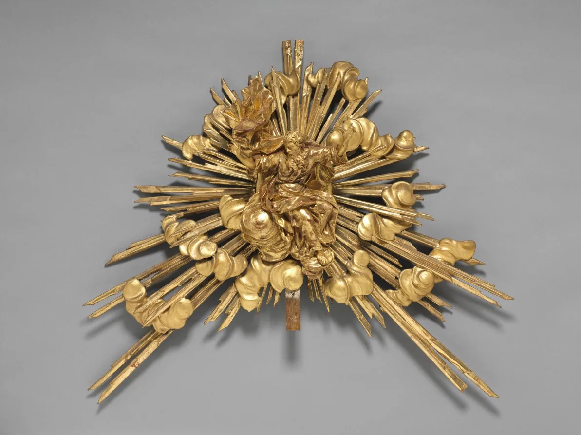 Joseph Matthias Goetz, Altarpiece with Relics, detail of God the Father, 1735 to 1740, gilded wood. Cleveland Museum of Art. The value here sits in the carving rather than in the material.